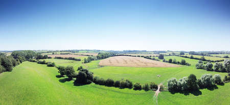 Panoramic aerial view of farmland in the oxfordshire countryside in englandの写真素材