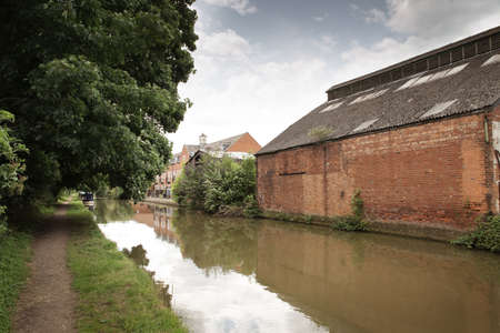 industrial area by a canal just outside the town of banbury in oxfordshire englandのeditorial素材