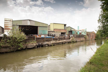 industrial area by a canal just outside the town of banbury in oxfordshire englandのeditorial素材