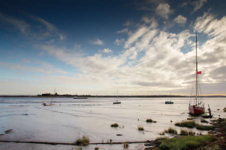 boats on the mud flats of the river chelmer in maldon essex england