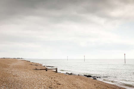 seascape of the coastline of the pebble beach of bognor regis in sussex englandの写真素材