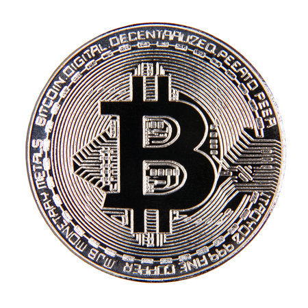 still life image of a single bitcoin made of metal isolated on whiteの写真素材