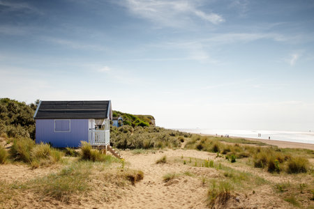 beach huts along the costline of Hunstanton in englandの写真素材