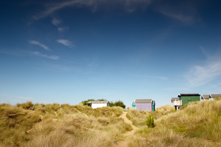 beach huts along the costline of Hunstanton in englandの写真素材