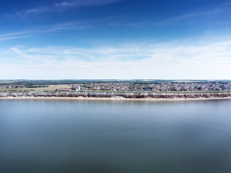 aerial view above the sea looking at the sea side town of Hunstanton in norfolkの写真素材