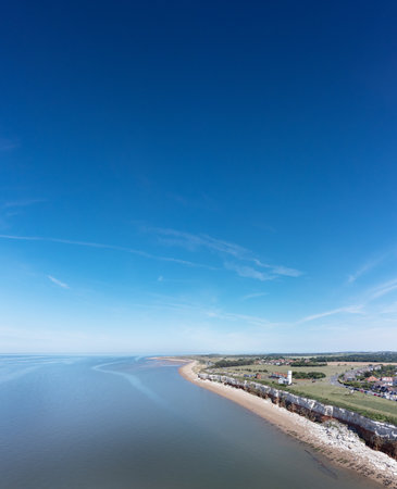 aerial view above the sea looking at the sea side town of Hunstanton in norfolkの写真素材