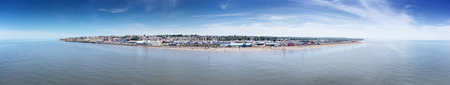 panoramic aerial view above the sea looking at the sea side town of Hunstanton in norfolkの写真素材
