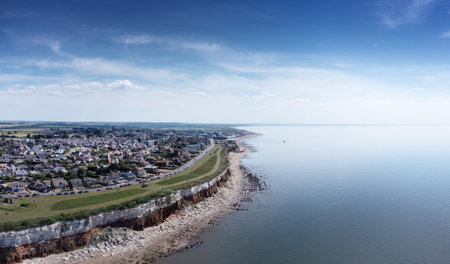 aerial view above the sea looking at the sea side town of Hunstanton in norfolkの写真素材