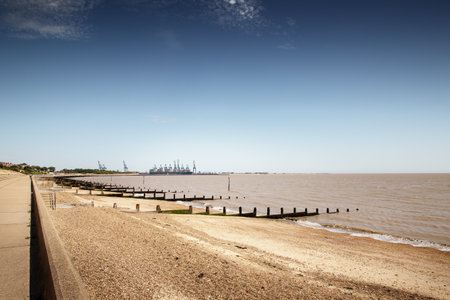 Seascape of the beach front at Dovercourt in Essex Englandの写真素材