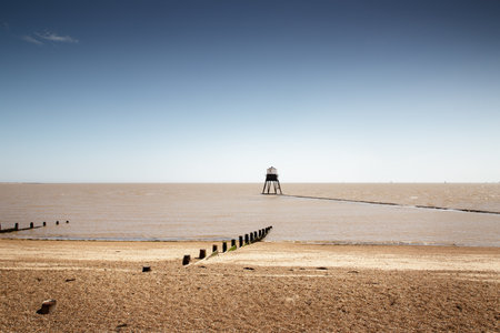 Seascape of the beach front at Dovercourt in Essex Englandの写真素材