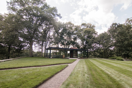 Exterior of Philip Johnson's glass house in New Canaan, CT. Bright photo with a lot of green. No people in photo.の写真素材