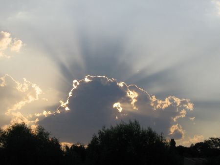 Clouds with sun beamsの写真素材