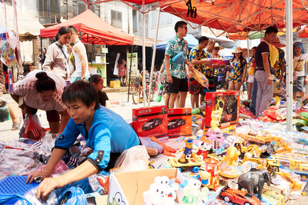 LUANG PRABANG, LAOS - APRIL 14, 2019. Local Lao people celebrating Pi Mai, the Lao New Year, with a big water festivalのeditorial素材