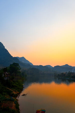 Colorful sunset on the Nam Ou River in Nong Khiaw, Laosの写真素材