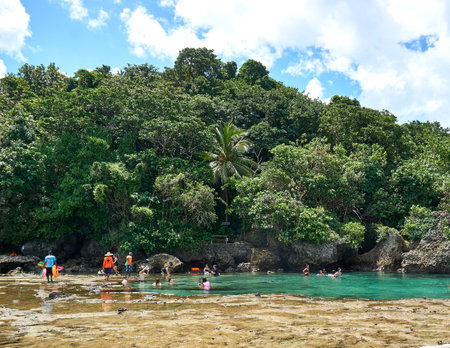 Philippines, Siargao Island, 22.July.2019. Tourists visit magpupungko natural rock pools in Siargao Philippinesのeditorial素材