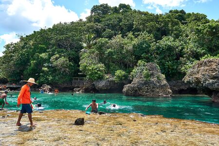 Philippines, Siargao Island, 22.July.2019. Tourists visit magpupungko natural rock pools in Siargao Philippinesのeditorial素材