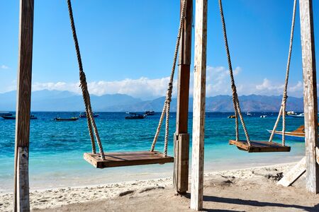 TRAWANGAN, INDONESIA - AUGUST.15.2019: Swing at the beach on Gili trawangan.のeditorial素材