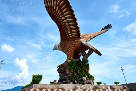 Langkawi, Malaysia - October 10, 2019. Eagle Square in Langkawi, near the Kuah port. This giant Eagle statue is the symbol of Langkawi island, Malaysiaの写真素材