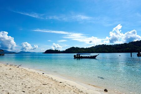 LANGKAWI, MALAYSIA - OCTOBER 15.2019:: Boat at Beach at island hopping in Langkawiの写真素材