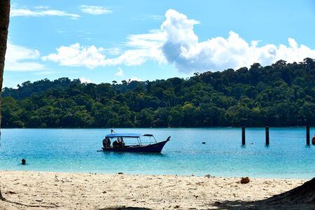 LANGKAWI, MALAYSIA - OCTOBER 15.2019:: Boat at Beach at island hopping in Langkawi.のeditorial素材