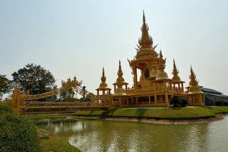 Chiang Rai, Thailand - February.10.2020: Golden Building in White Temple Rong Khun temple, Chiang Rai province, northern Thailand.のeditorial素材