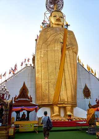 Bangkok, Thailand - January.19.2020: Golden buddha at Wat Intharawihan temple, Bangkok, Thailand. Traditional religious architecture, one of the main attractions on Bangkokのeditorial素材