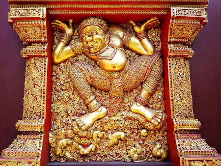 A Golden Giant Guardian Statue at Chiang Mai Thailand Templeの写真素材