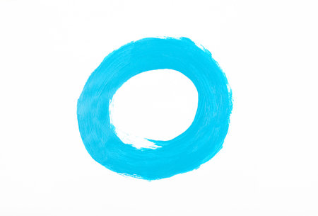 Blue round paint stroke on a white backgroundの写真素材