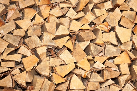 A stack of firewood. Great background or texture.の写真素材