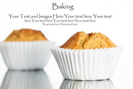 Close-up of a freshly home baked banana muffin on a reflective surface  Isolated on white の写真素材