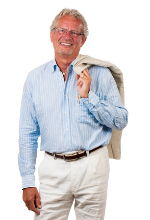 A happy confident business man standing with jacket over his shoulder and looking at camera  Isolated on white の写真素材
