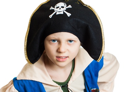Portrait of a young boy dressed up as a pirate. Isolated on white.の写真素材