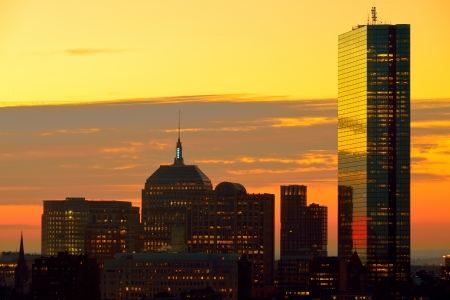 Dramatic sunrise over Boston Downtown as seen from Cambridgeのeditorial素材