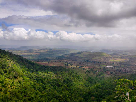 A View Of The Indian Mountains With Forest Trees And Cloudy Sky.の写真素材