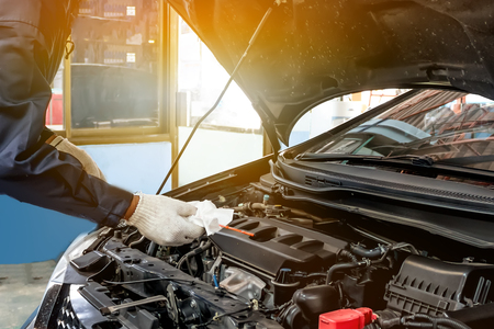 Regular car care makes car use. Safe and confident in driving. Regular inspection of used cars. It is very well done.Such as oil Check engine.の写真素材