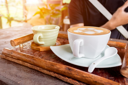 Cup of coffee and tea hot on wooden table.の写真素材