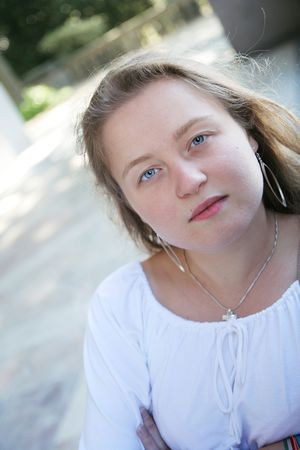 portrait of a natural young woman during a beautiful summer dayの写真素材
