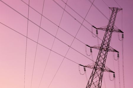 Electric pylon by a cold winter eveningの写真素材