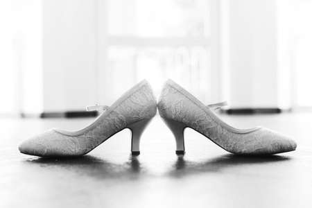 wedding shoes of the bride back to back black and whiteの写真素材