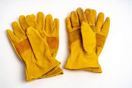 Workmans leather gloves for industrial ,fire protection type ,isolated on white background.の写真素材
