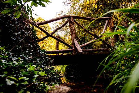 Quaint rustic village bridge taken near an estate in the United States.の写真素材