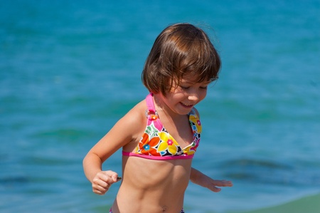 Happy child on the beachの写真素材