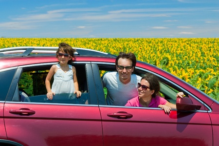 Family vacation. Parents with child in car tripの写真素材