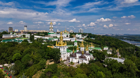 Aerial top view of Kiev Pechersk Lavra churches on hills from above, Kyiv city, Ukraine