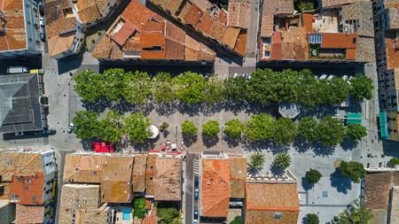 Aerial top view of residential area houses roofs and streets from above, medieval town backgroundの写真素材