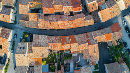 Aerial top view of Bram medieval village architecture and roofs from above, Southern Franceの写真素材