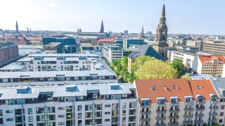Beautiful aerial view of Copenhagen skyline from above, Nyhavn historical pier port and canal with...