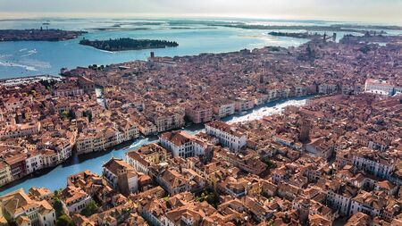 Venice city Grand Canal and houses aerial drone view, Venice island cityscape and Venetian lagoon...