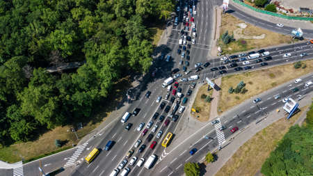 Aerial top view of road junction from above, automobile traffic and jam of many cars, transportation conceptのeditorial素材