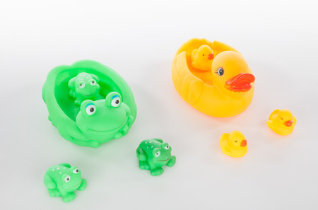 plastic bath duck toys  on white backgroundの写真素材